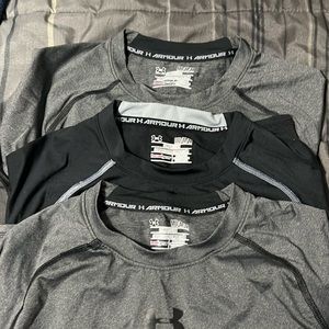 Three long sleeve Under Armour men’s tops